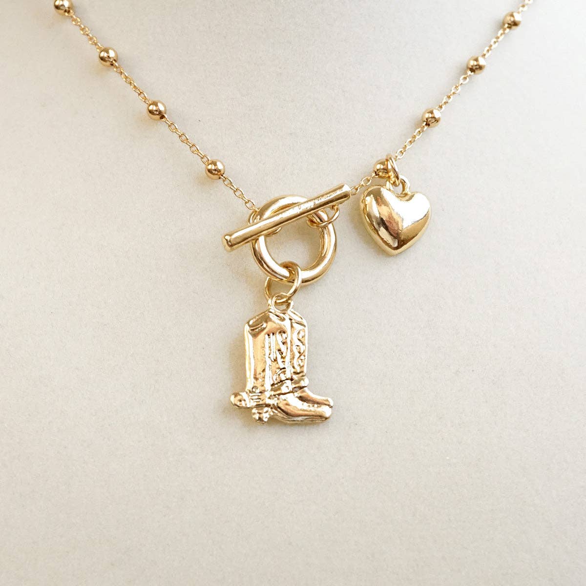 Cowgirl Charm – Dainty Boots & Heart Necklace in Gold
